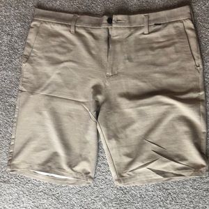 Men’s tan Hurley brand shorts with “NIKE DRI-FIT” technology.  Size 36.